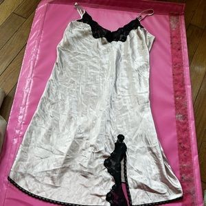 Light pink slip dress black lace detailing